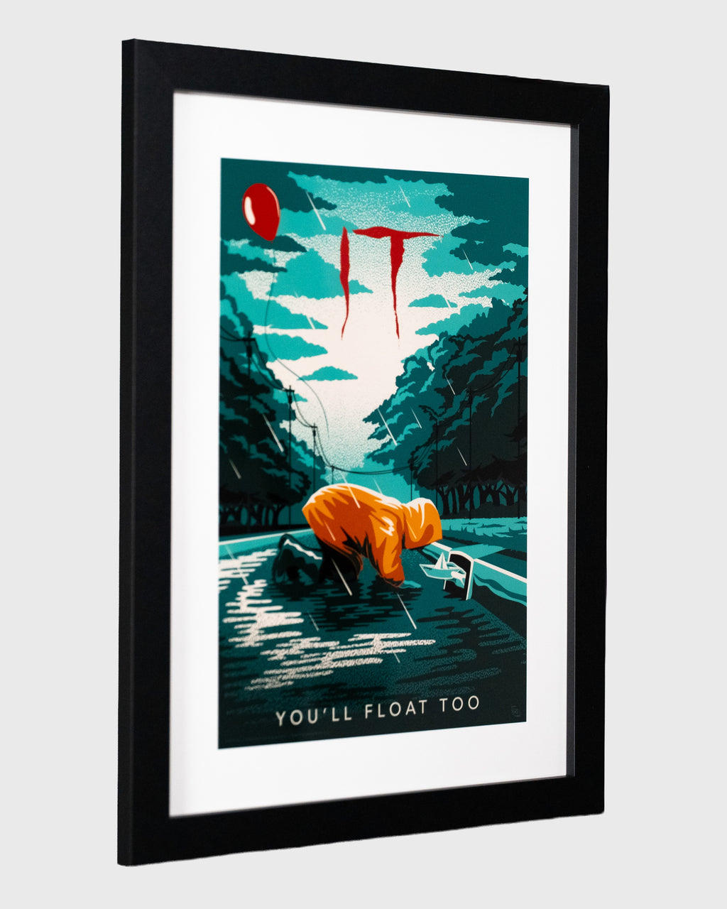 plakat IT To w czarnej ramie widok perspektywiczny plakat filmowy horror