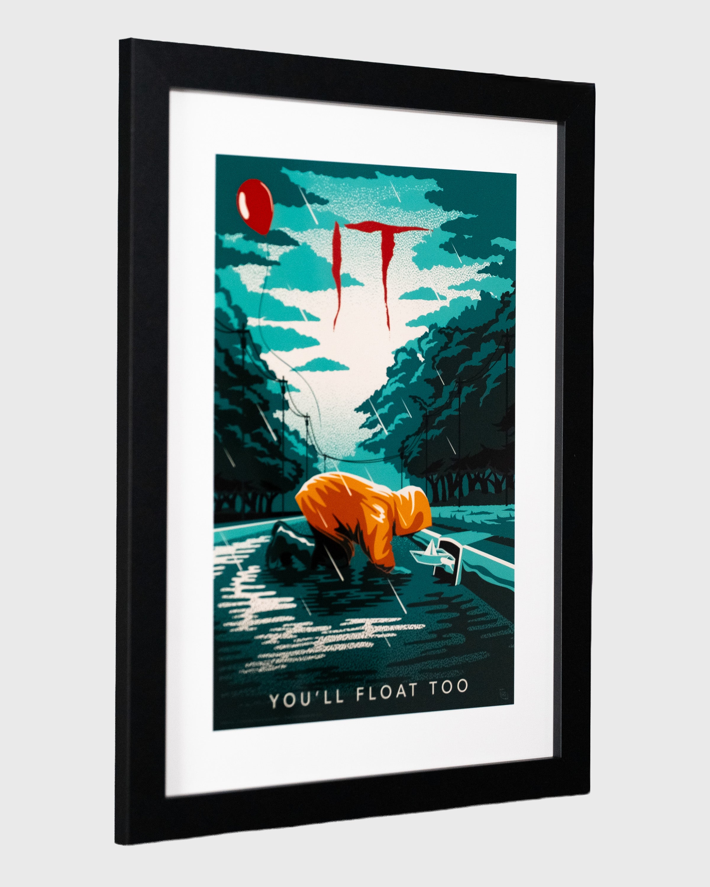 plakat IT To w czarnej ramie widok perspektywiczny plakat filmowy horror