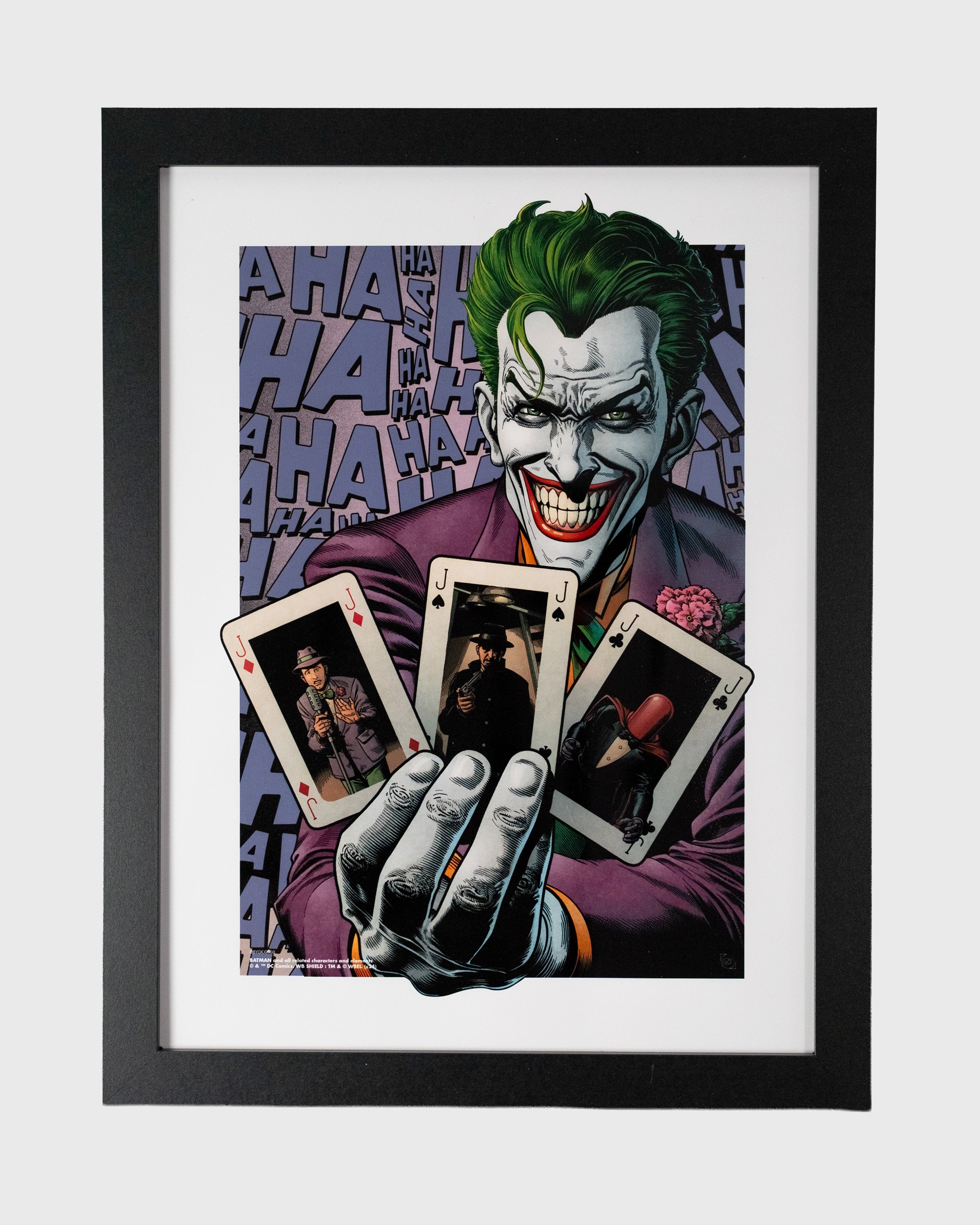 Plakat Joker w czarnej ramie z białym passe-partout, ilustracja komiksowa z kartami do gry