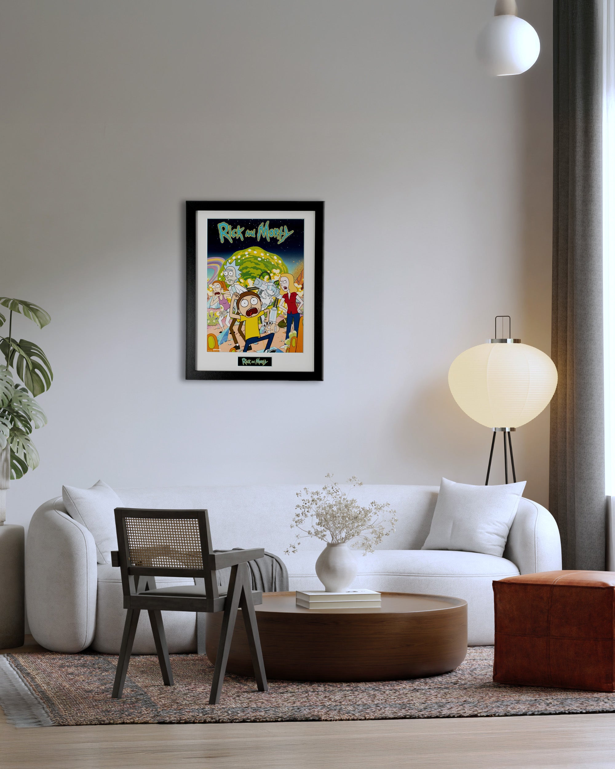 plakat Rick and Morty w salonie nowoczesna aranżacja ściany nad kanapą